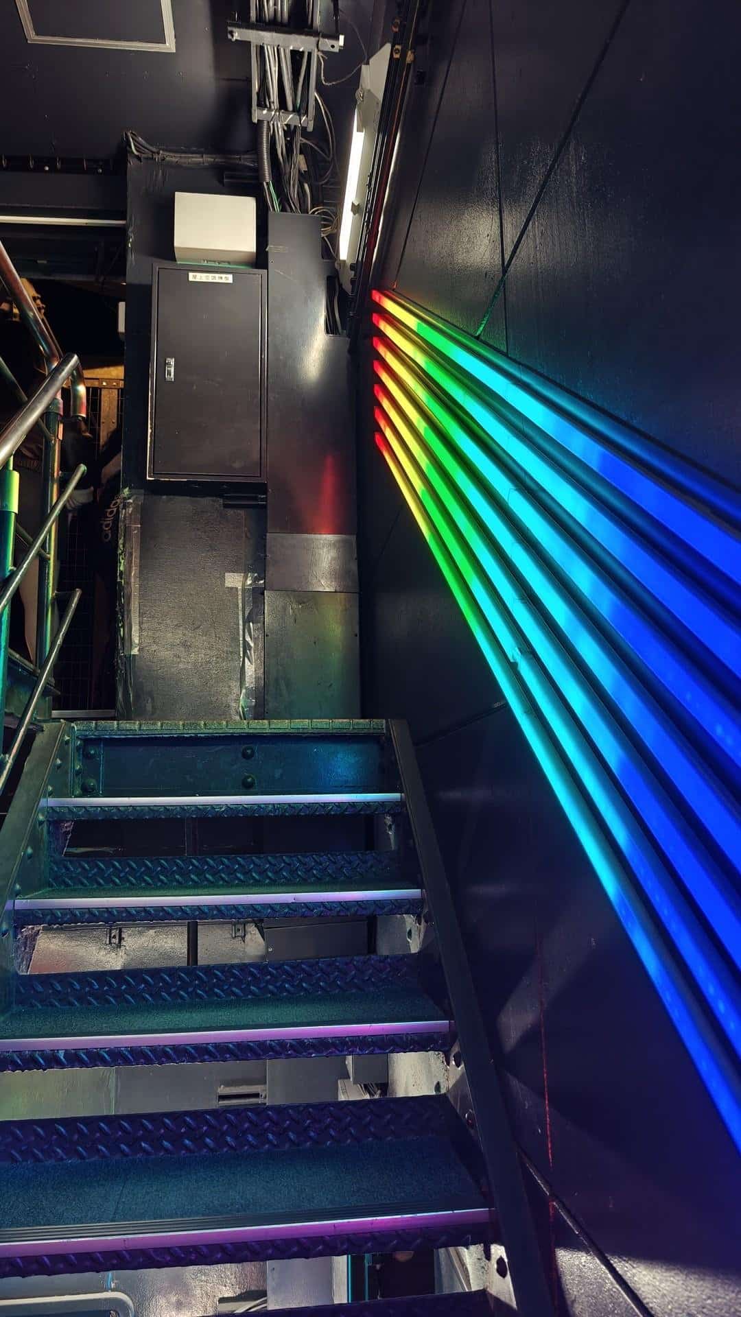 Staircase with rainbow neon lights