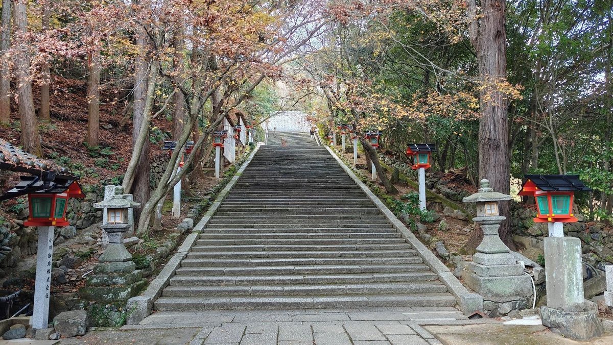 Stone steps with lanterns and trees in autumn