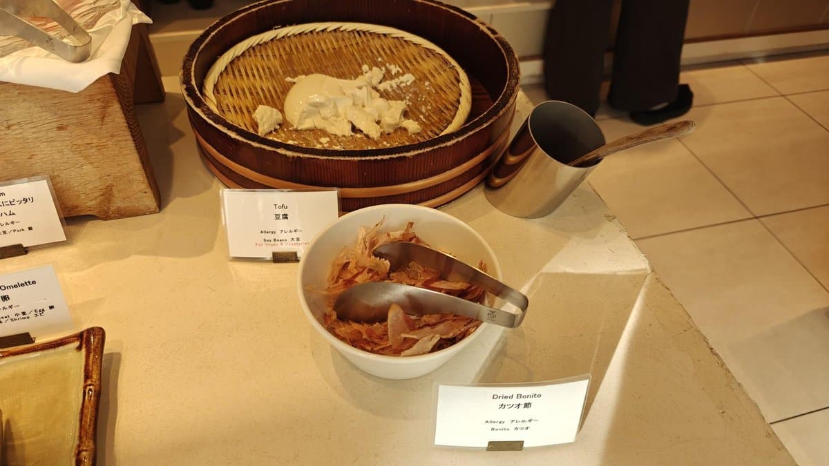 Tofu and bonito with serving utensils