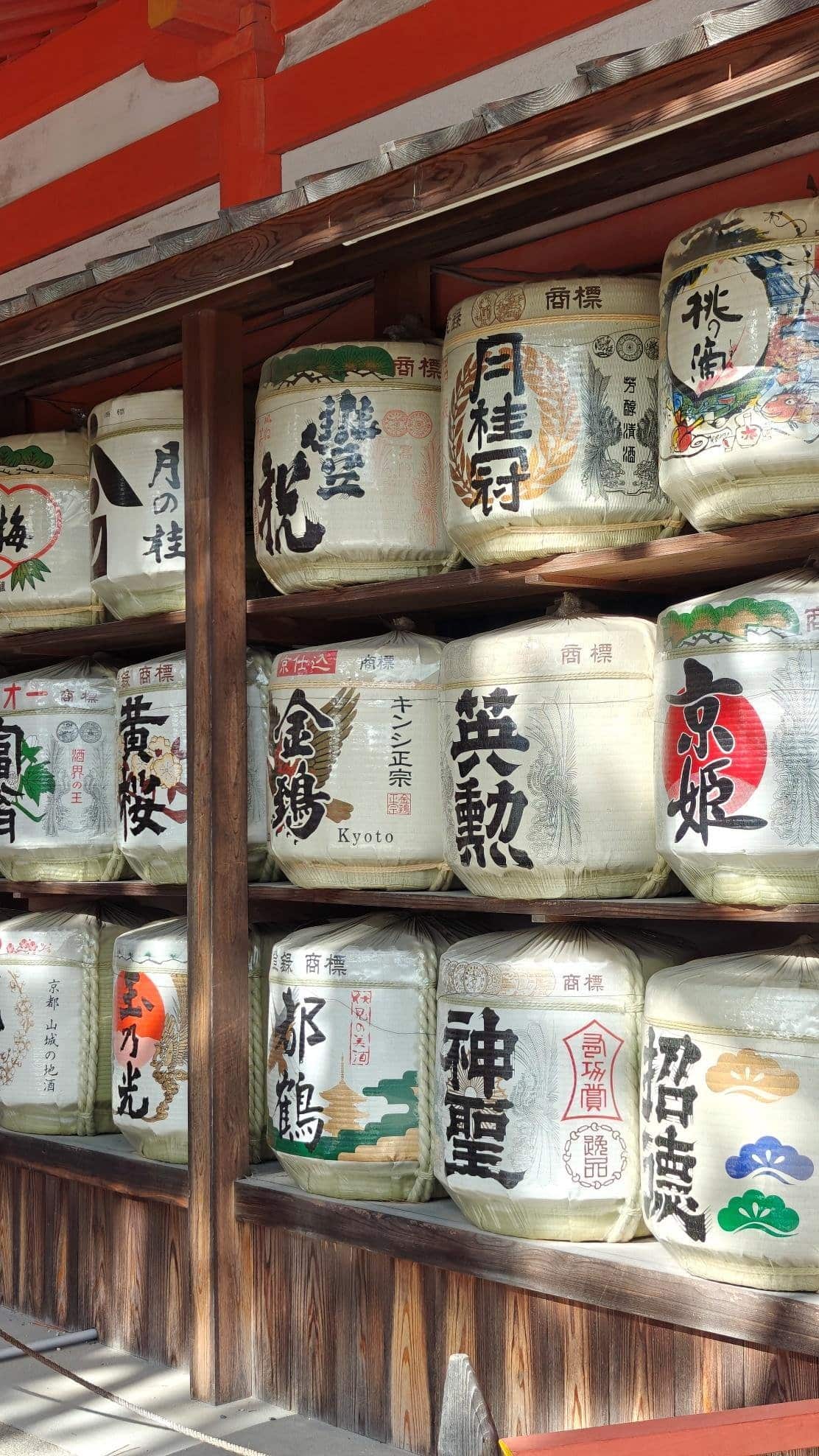 Traditional sake barrels in a Japanese shrine setting