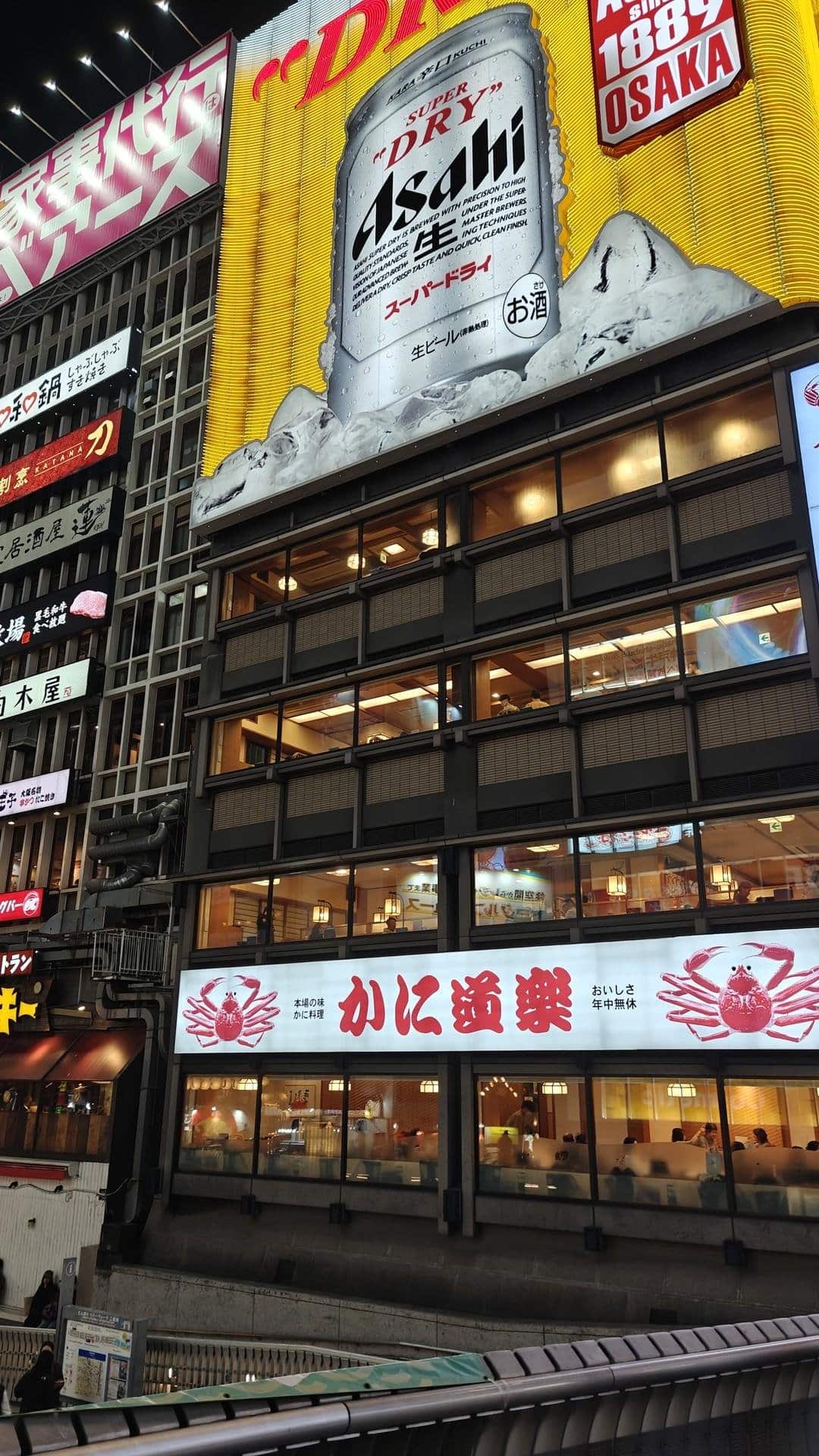 Vibrant city street with bright signage