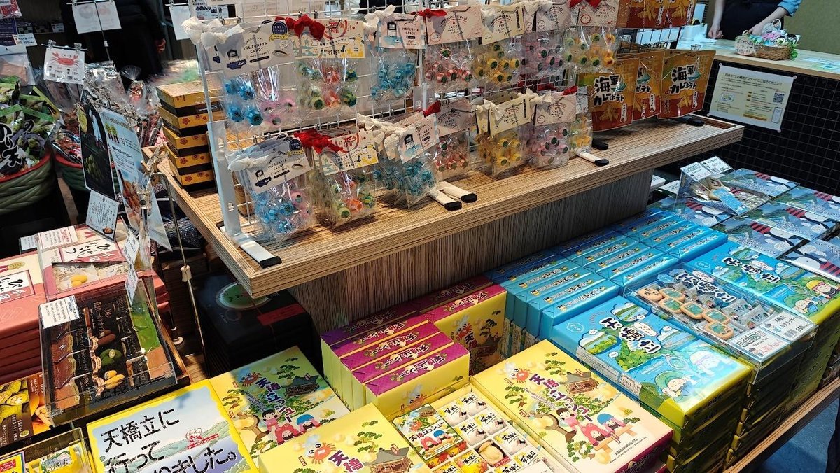 Assorted Japanese snacks and candies on display in a store.