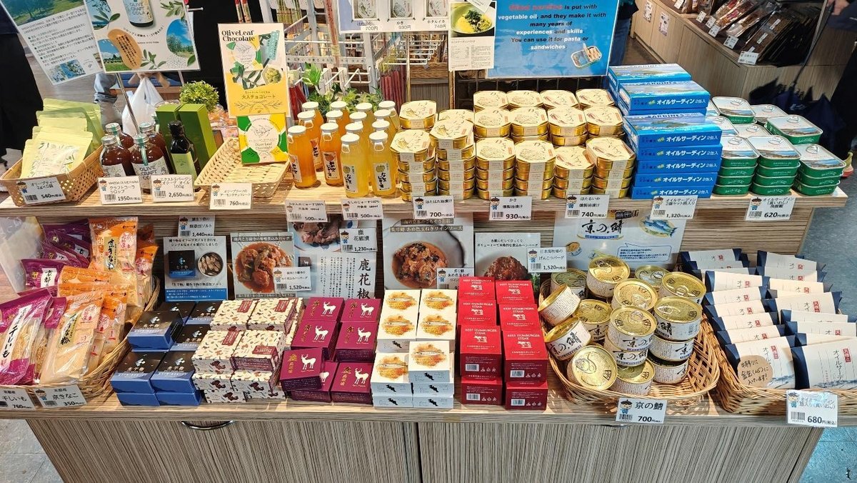 Assorted Japanese snacks and canned foods on display