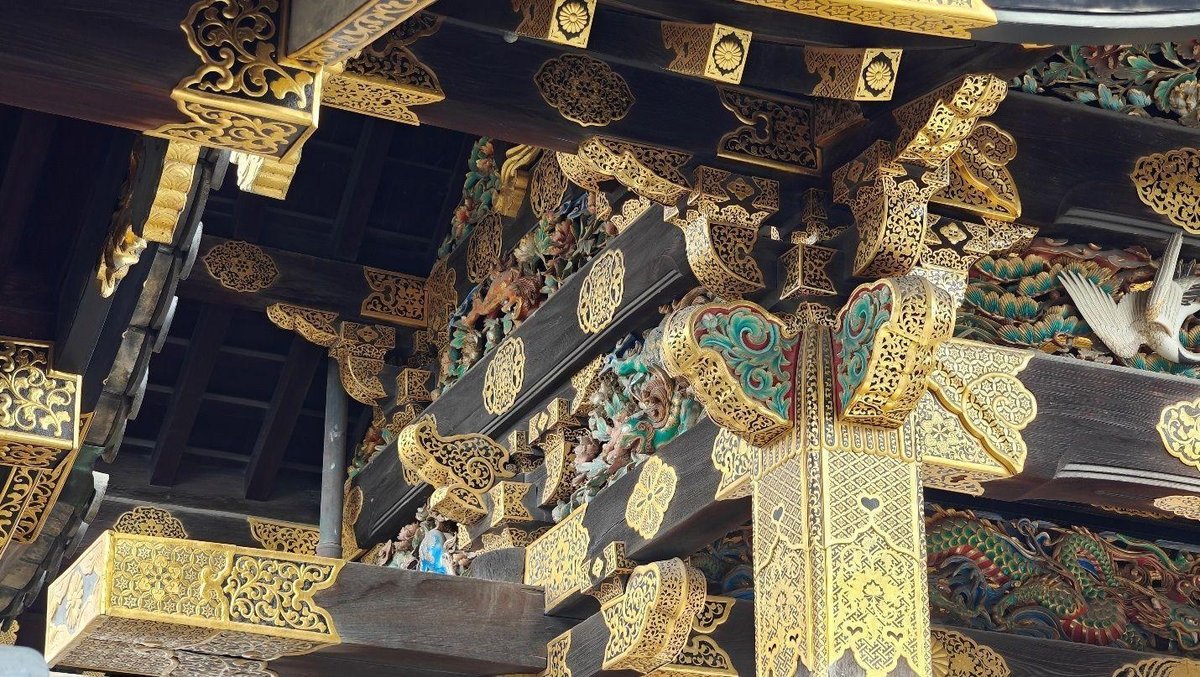 Intricate golden temple carvings