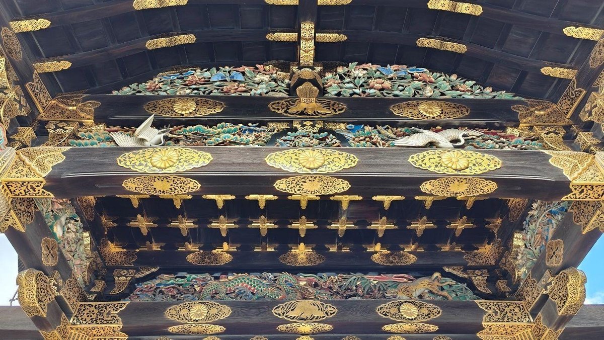Intricate temple roof with gold carvings