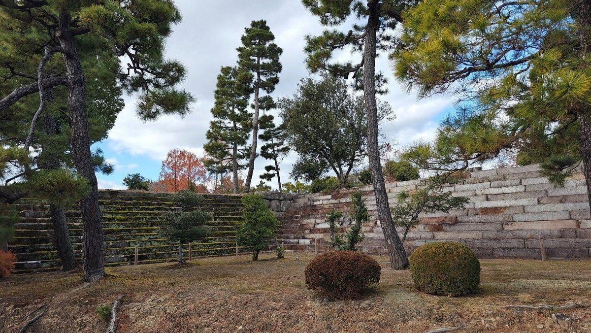 Japanese garden with stone wall