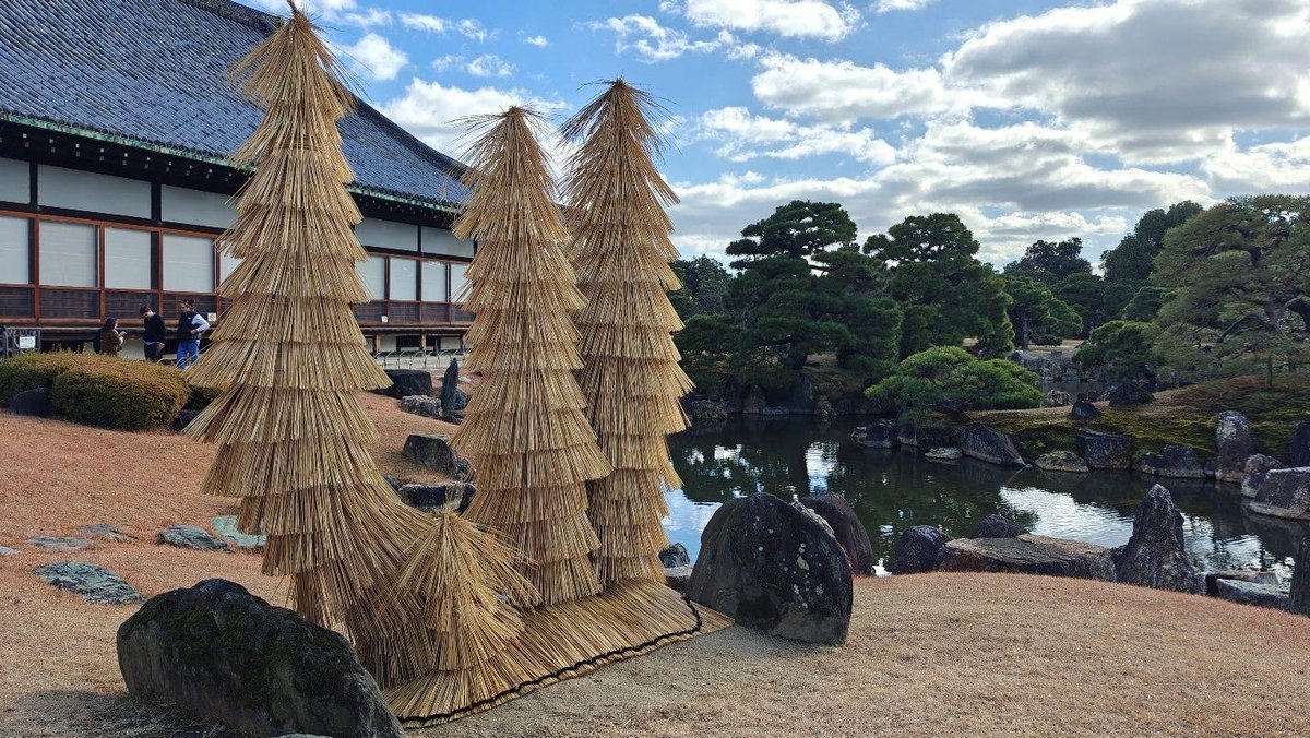Japanese garden with straw structures