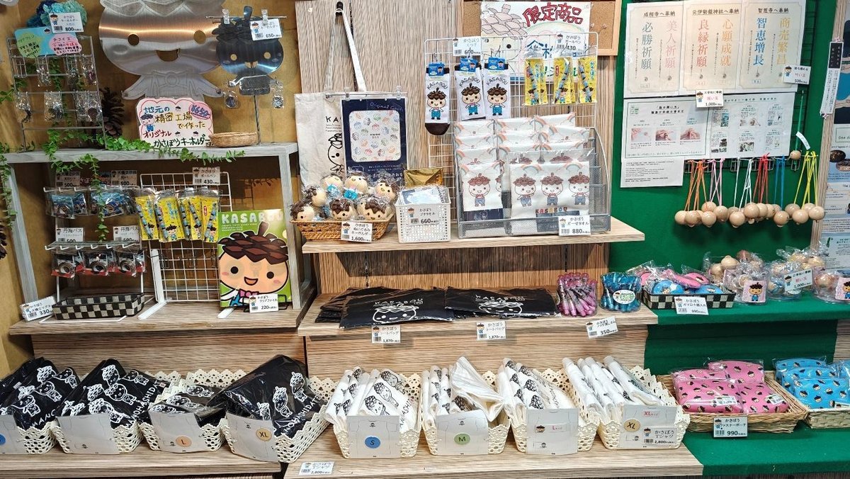 Japanese souvenir shop display with cartoon character items