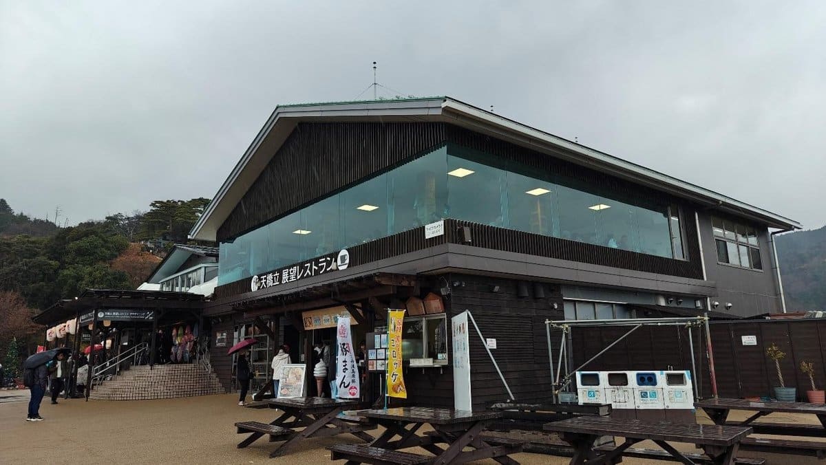 Modern building with glass windows on a cloudy day