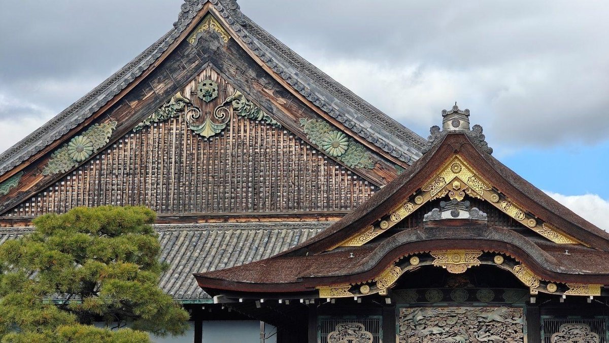 Ornate Japanese temple roof with carvings