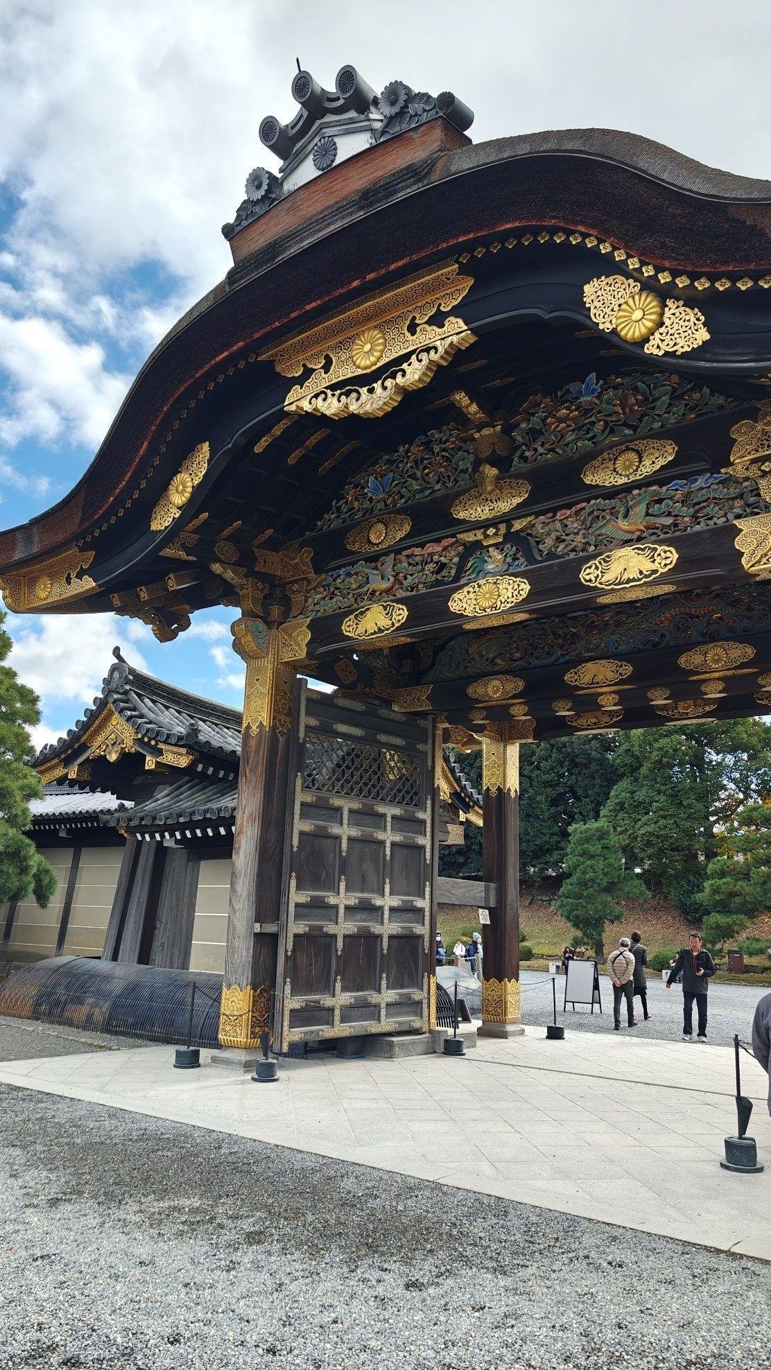 Ornate traditional gate with gold accents