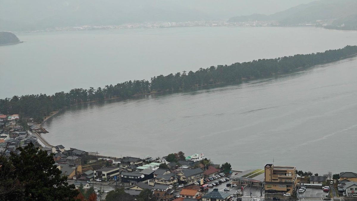 Scenic view of a peninsula with water and forests
