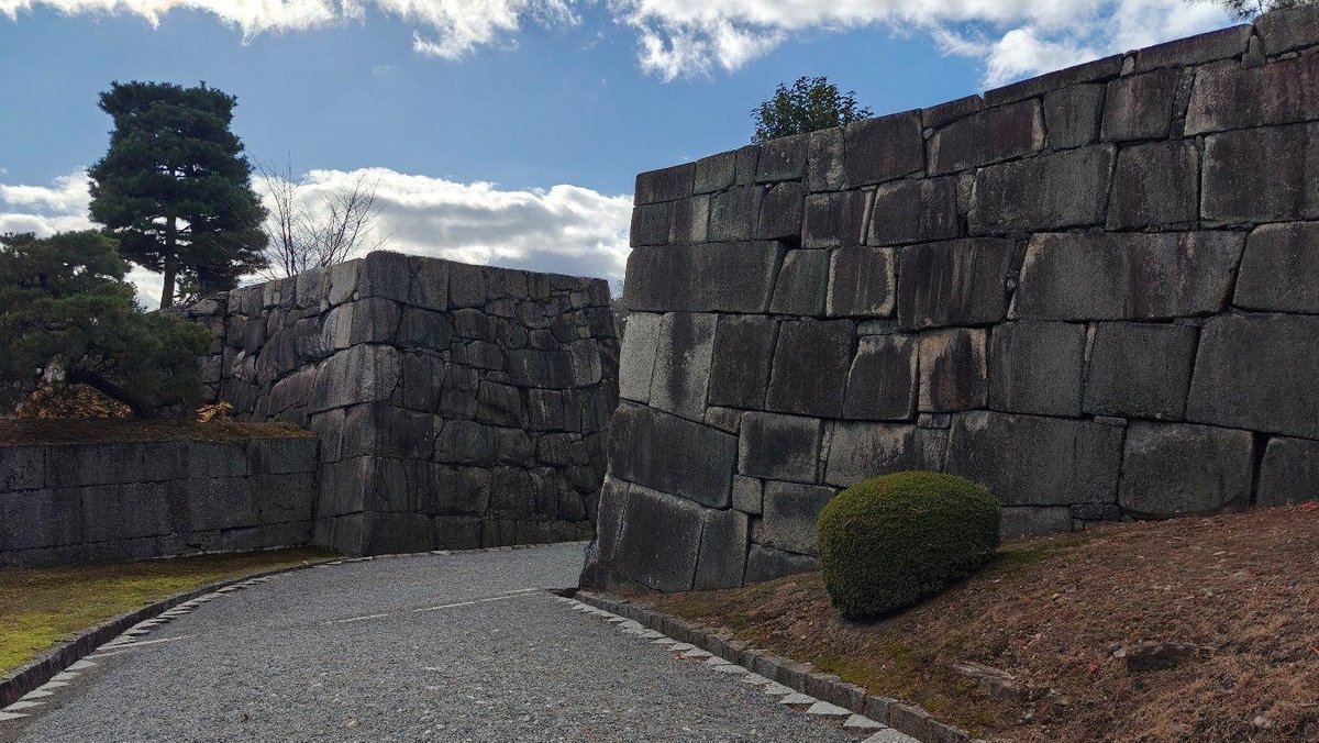 Stone pathway beside ancient walls