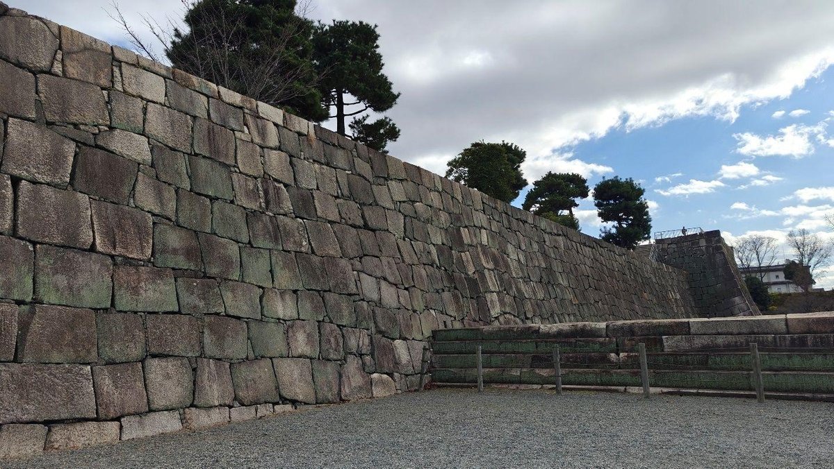 Stone wall under cloudy sky