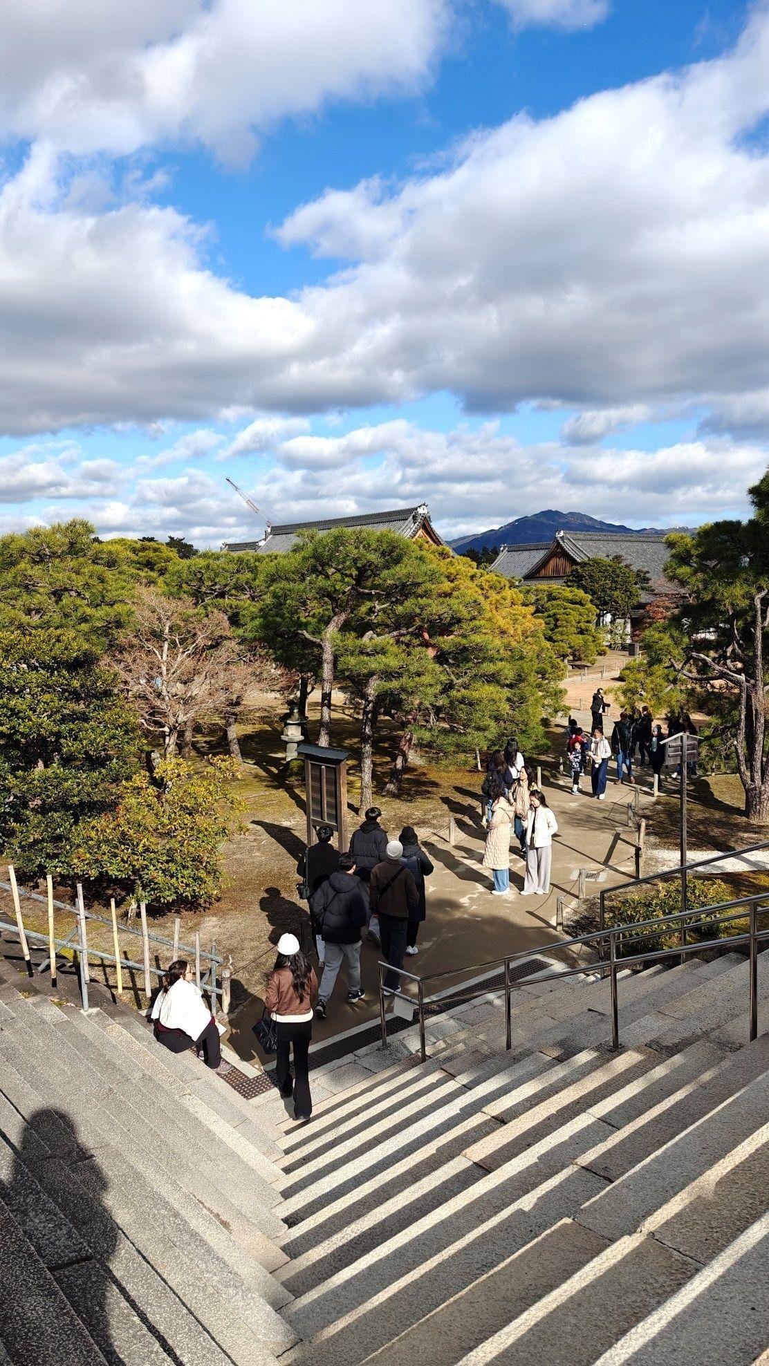 Tourists exploring scenic temple grounds