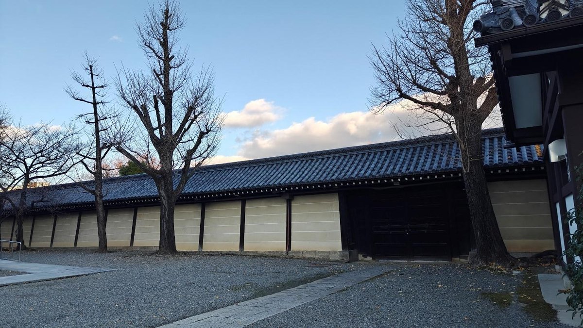 Traditional building with trees and clear blue sky