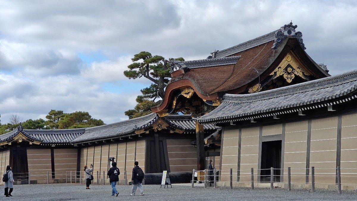 Traditional Japanese building with tourists