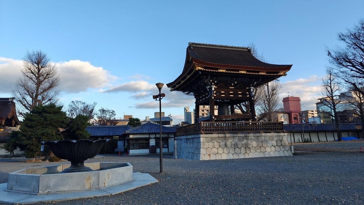 Traditional Japanese pagoda under clear blue sky