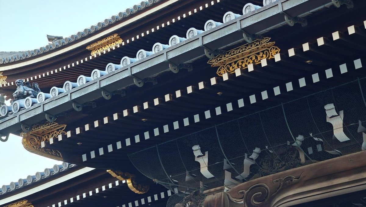 Traditional Japanese temple roof with ornate details