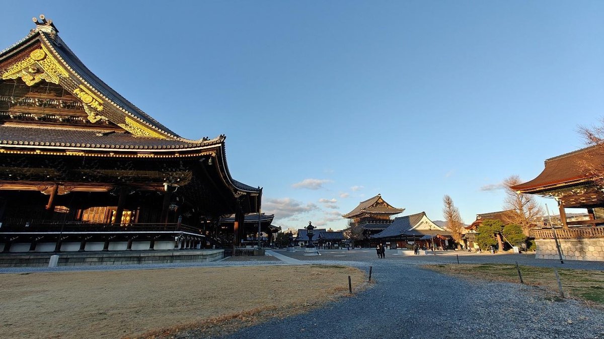 Traditional Japanese temple under a clear blue sky