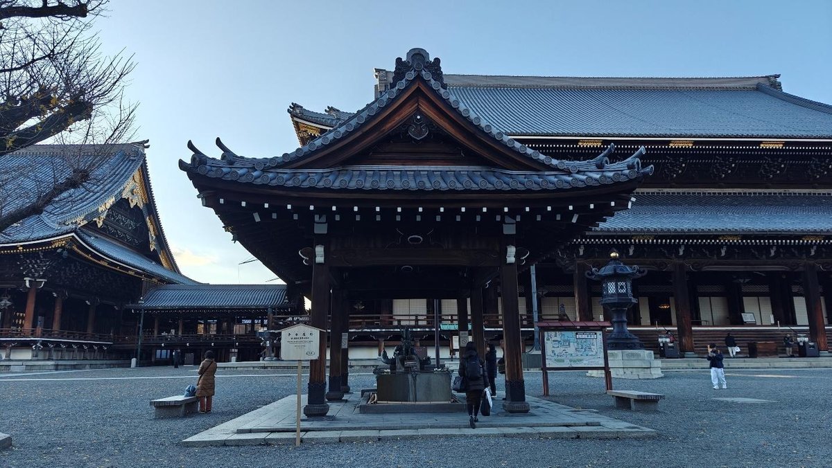Traditional Japanese temple with ornate roof in daylight