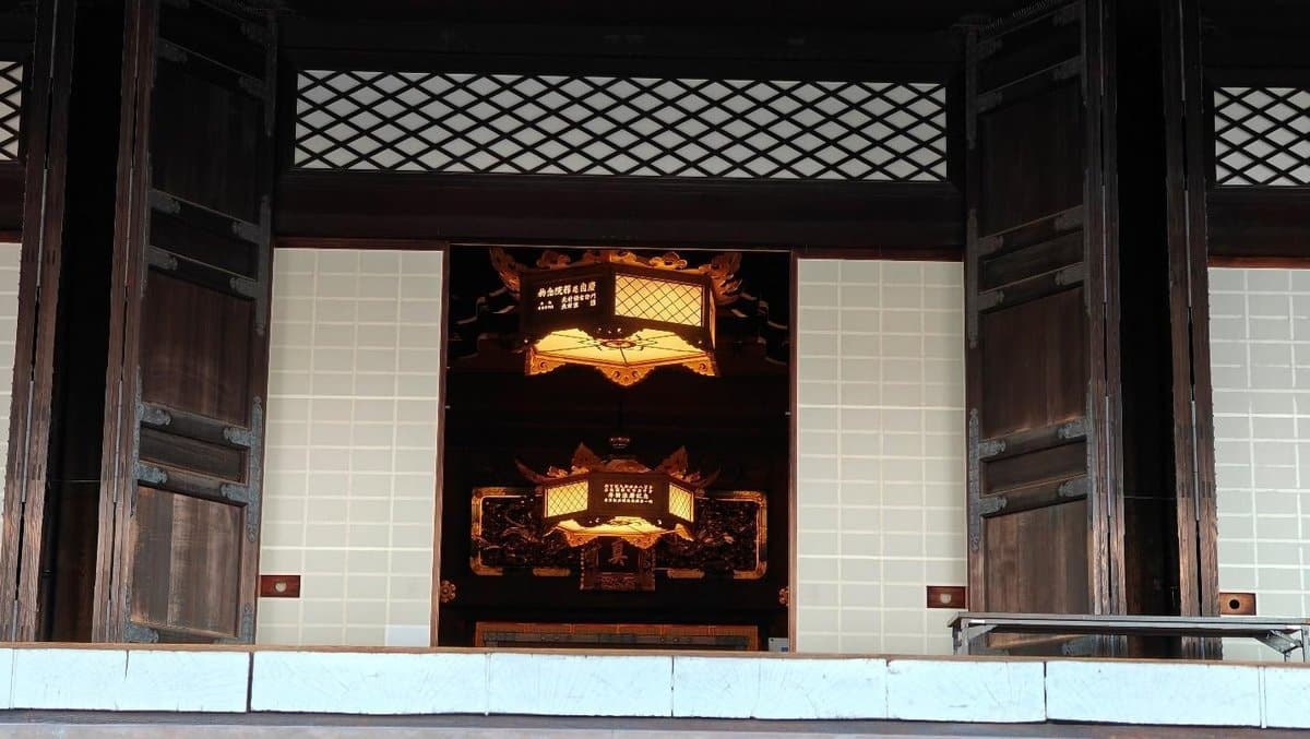 Traditional lantern in wooden architectural setting