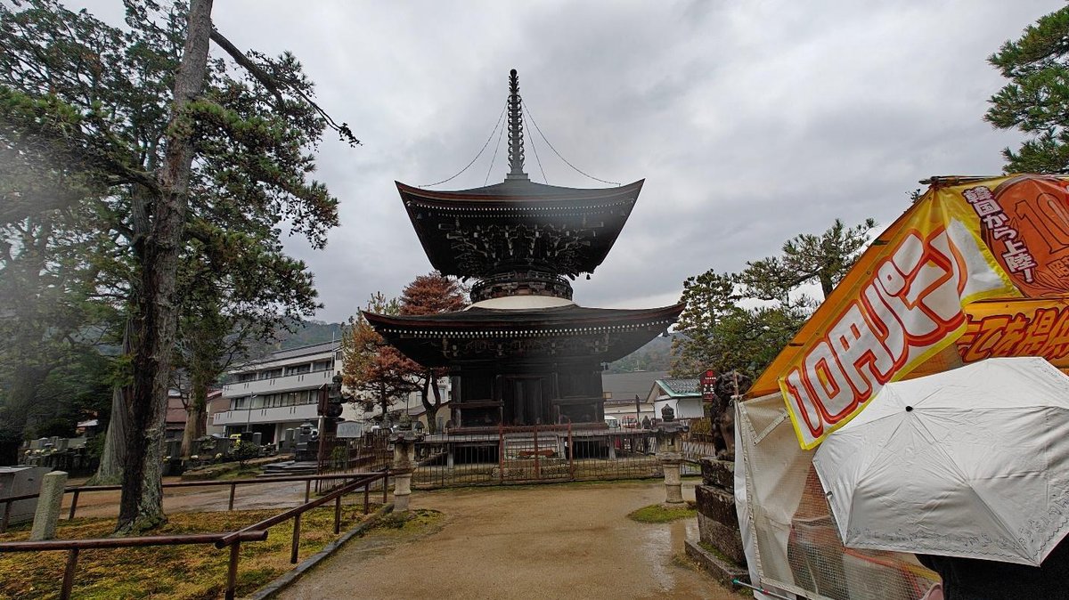 Traditional pagoda with trees on a cloudy day