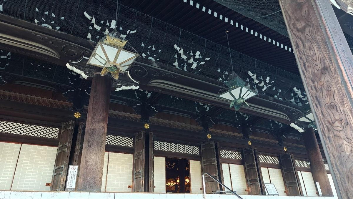 Traditional wooden architecture with ornate hanging lanterns