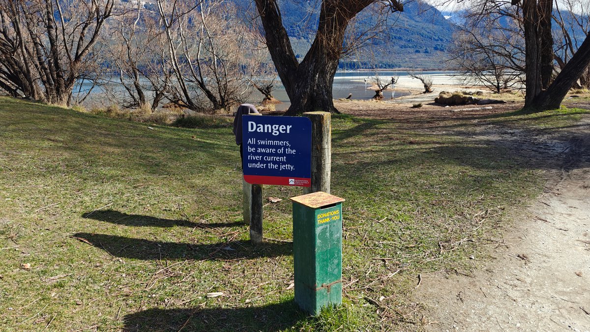 A blue Queenstown Lakes District Council 'Danger' sign