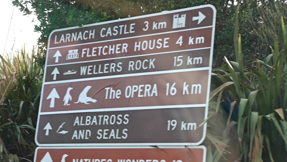 A brown tourist direction sign on the peninsula
