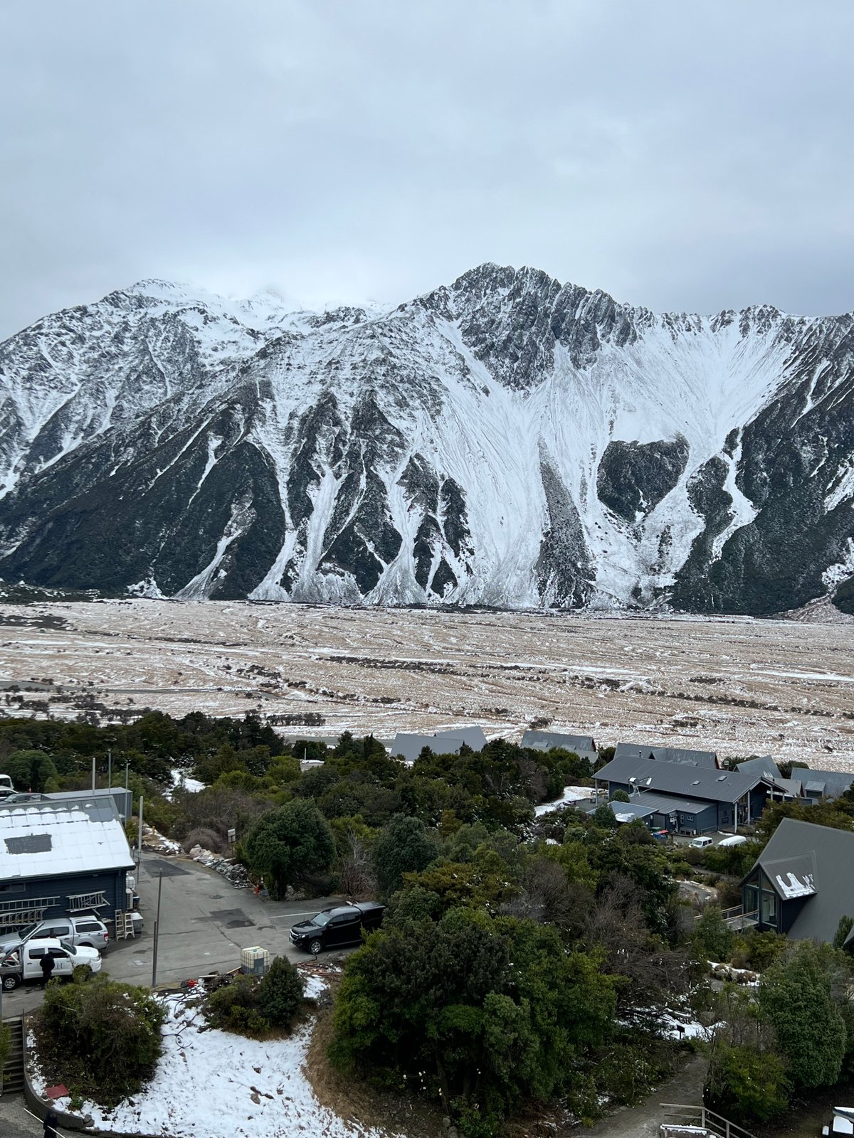 A closer framing of a snow peak rising