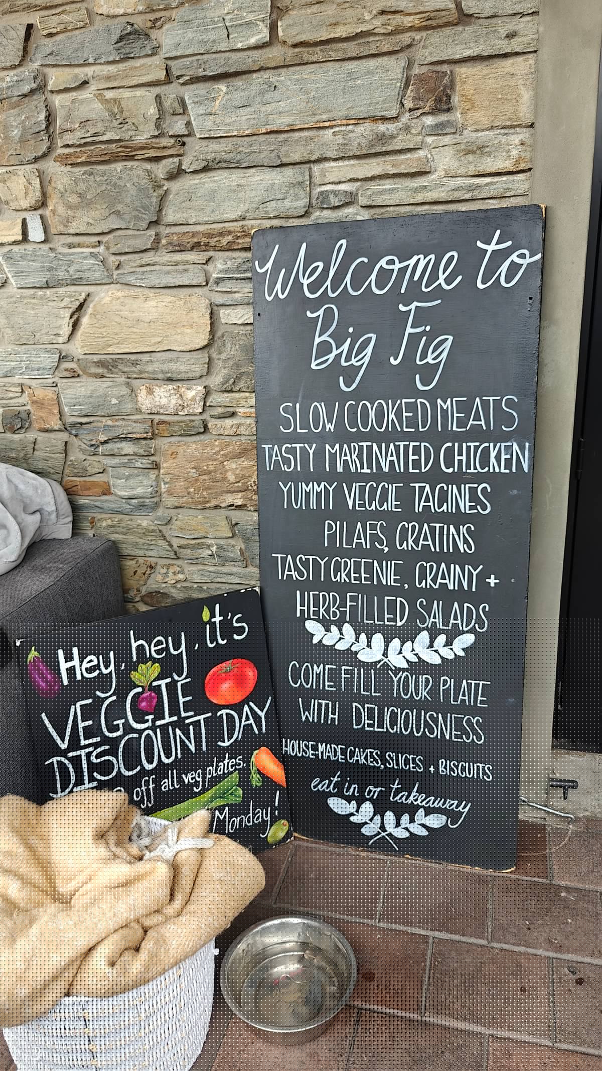 A-frame chalkboard reading 'Welcome to Big Fig -