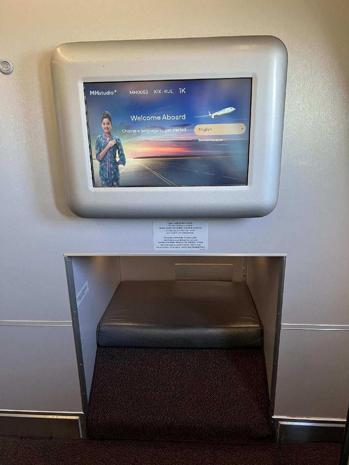 Airplane welcome screen and seat step