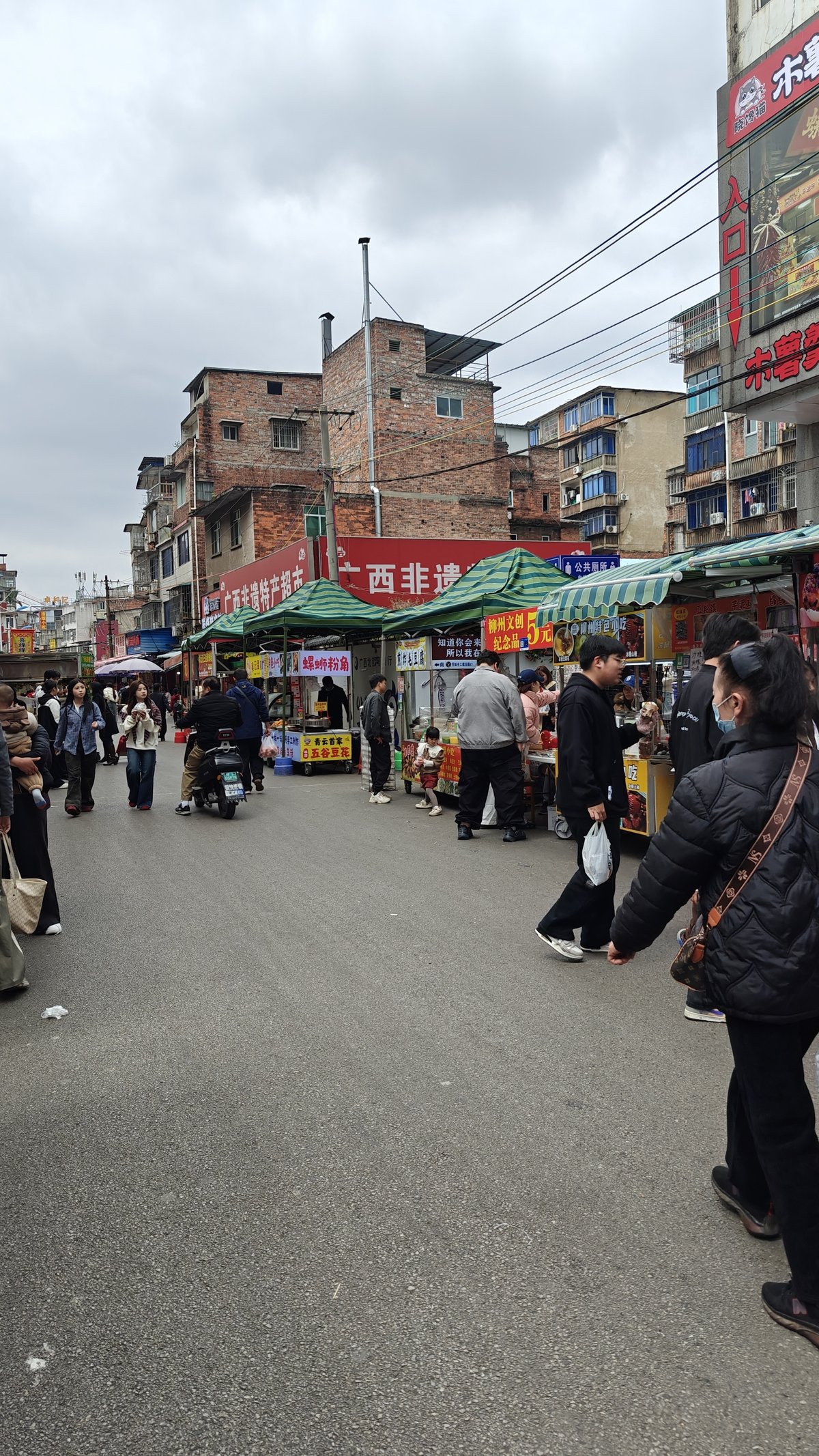 Alley with stalls and shoppers