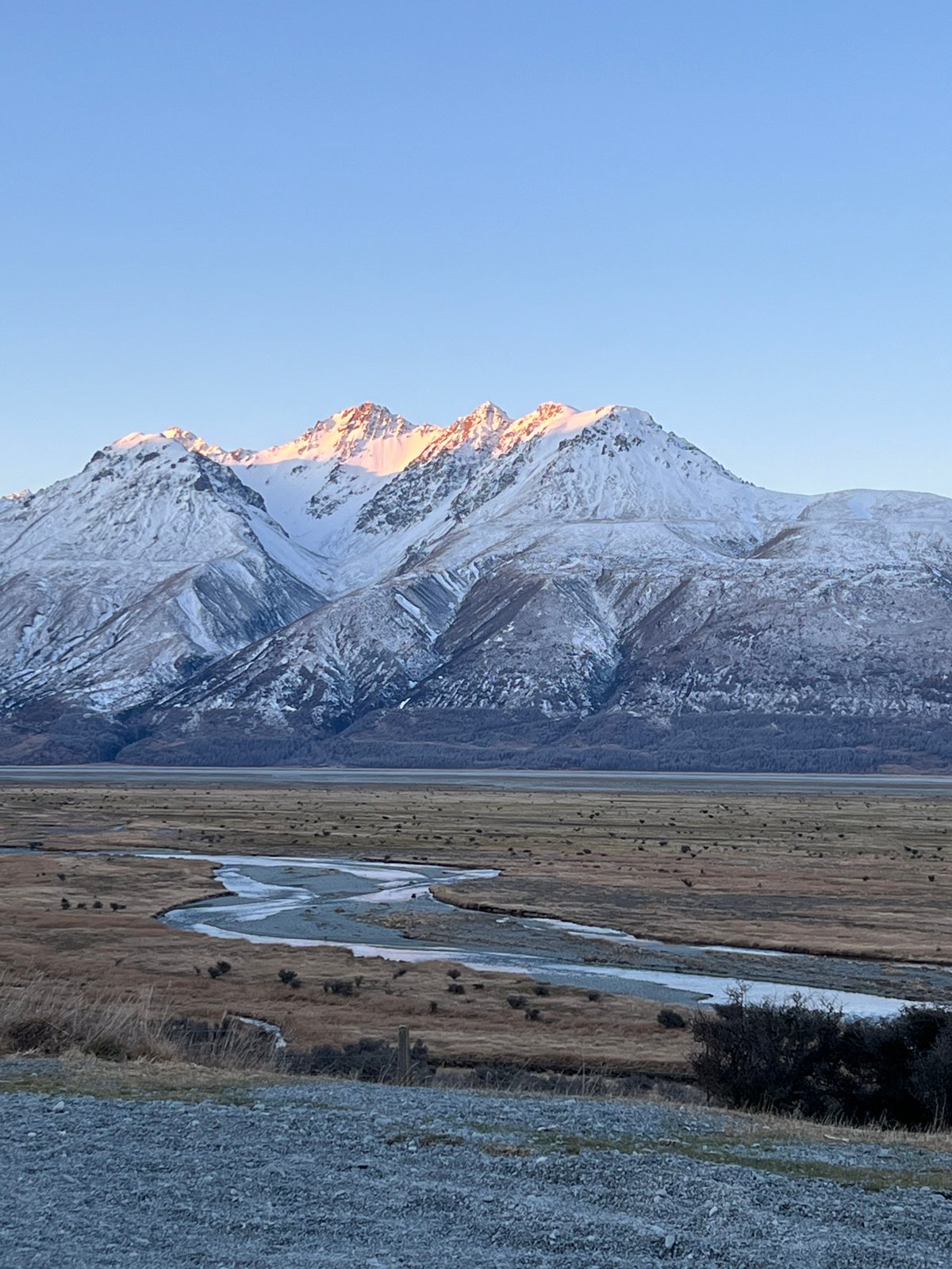 Alpenglow on snow-capped peaks