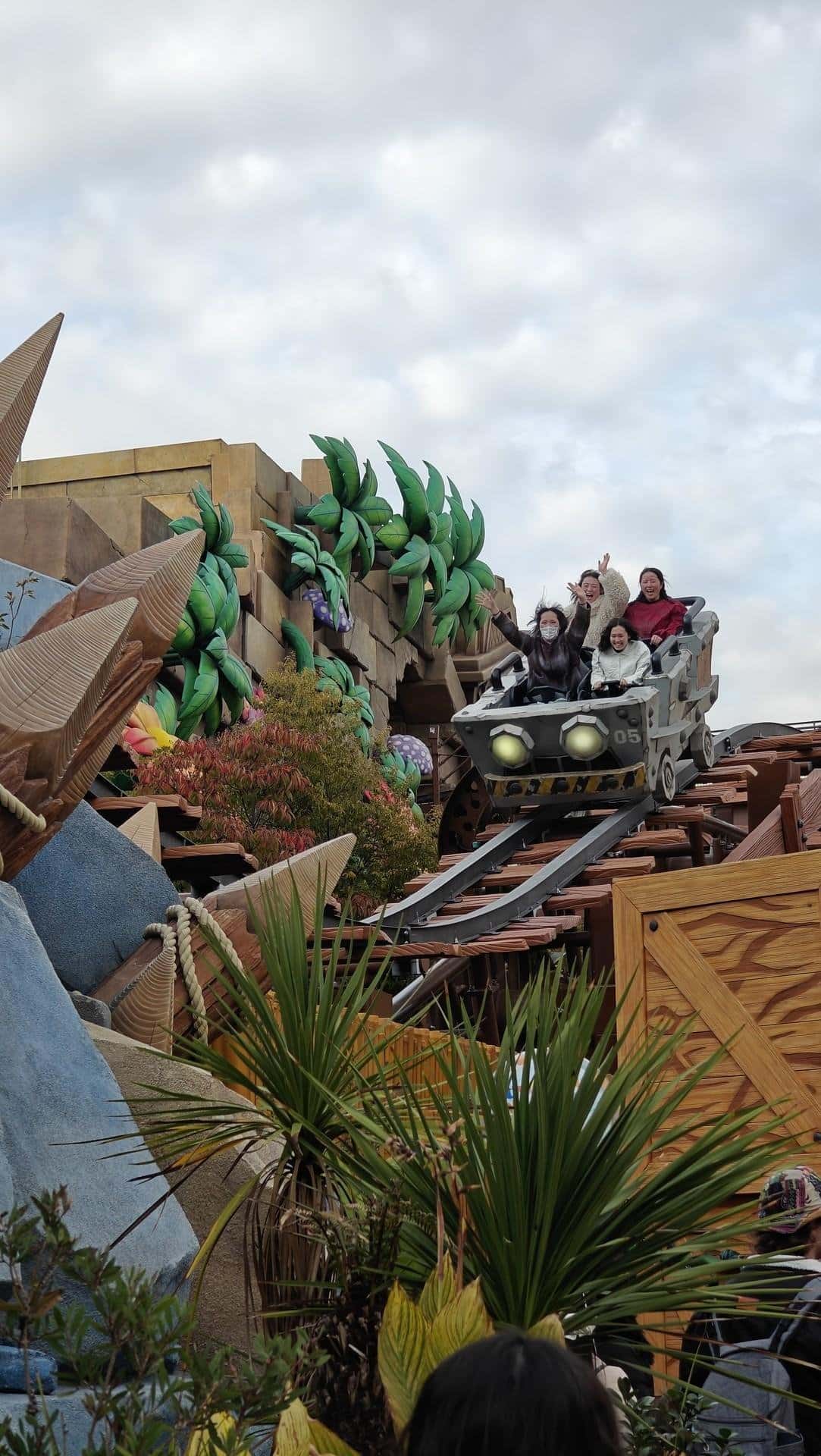 Amusement park ride with excited riders
