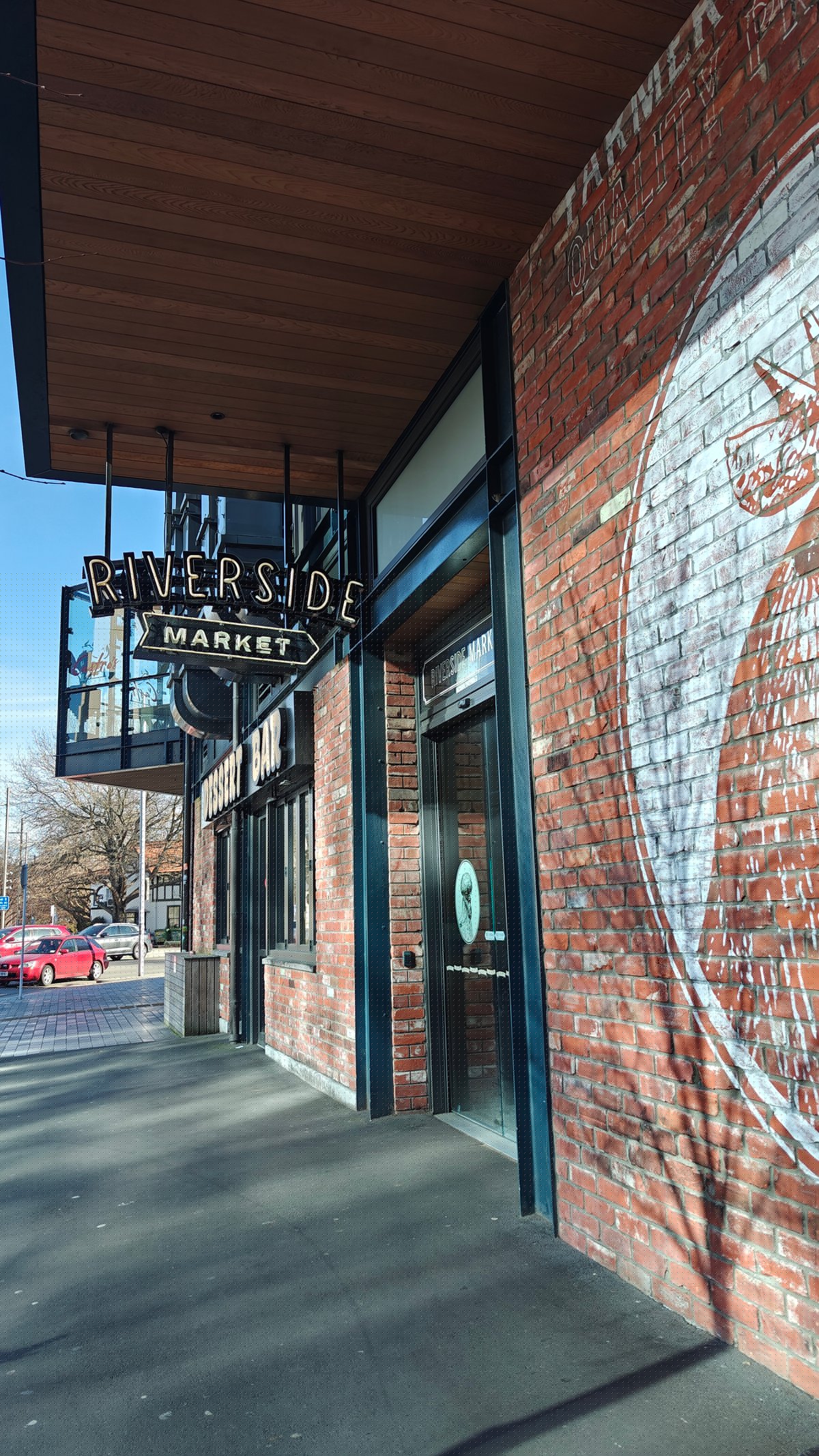 Approach to Riverside Market along the covered brick