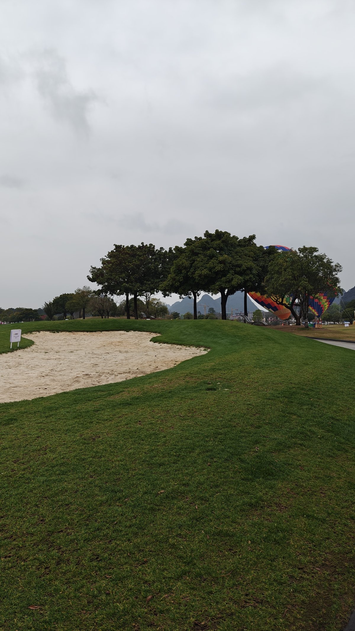 Balloons visible beyond bunker
