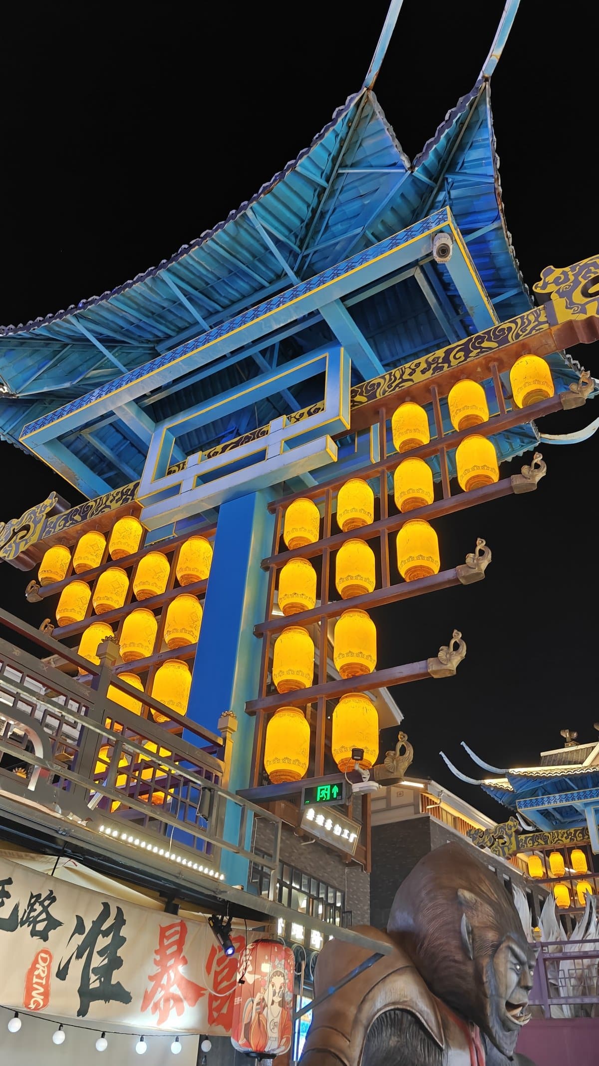 Blue pagoda with golden lanterns