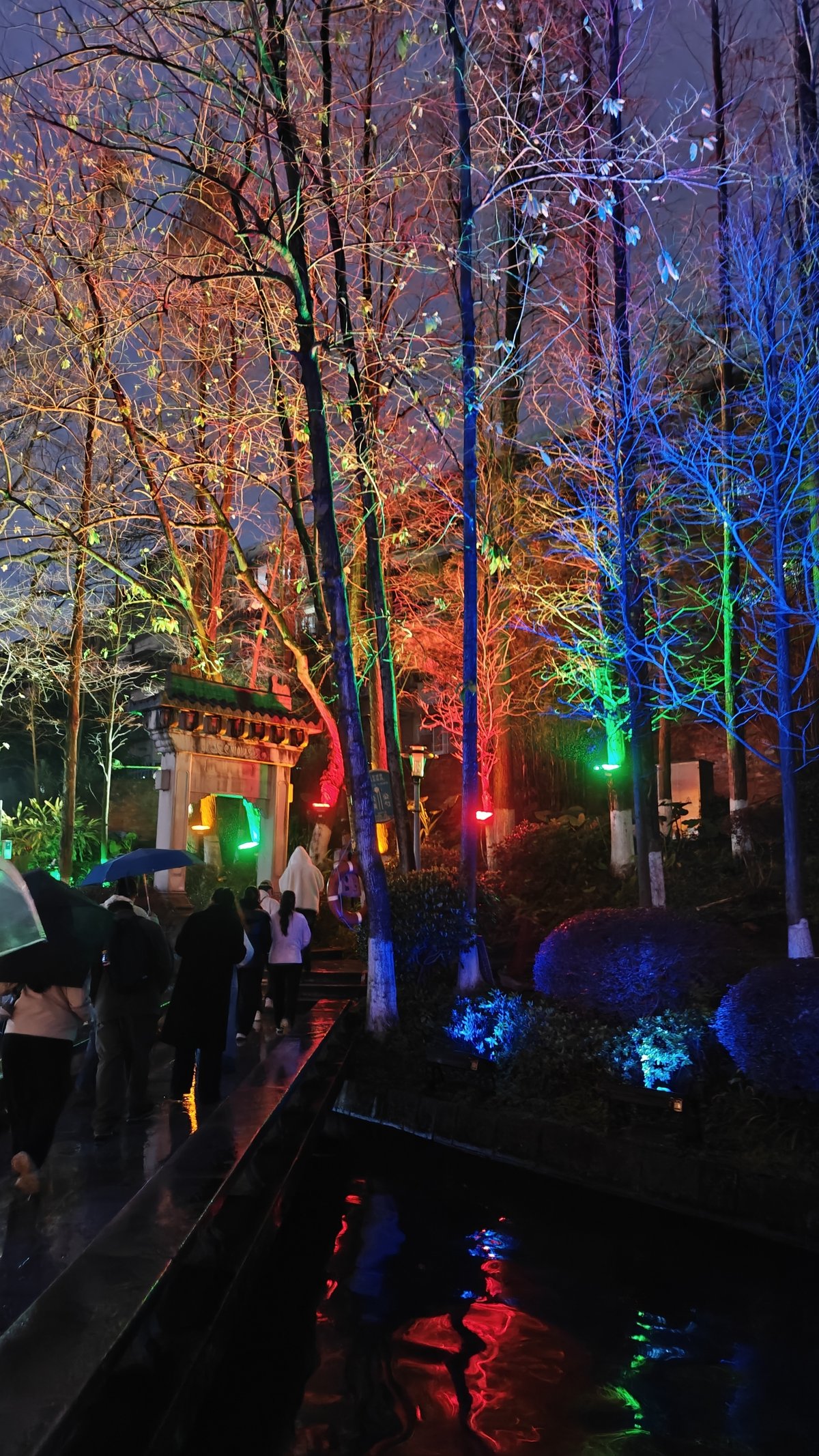 Blue purple lit park walkway