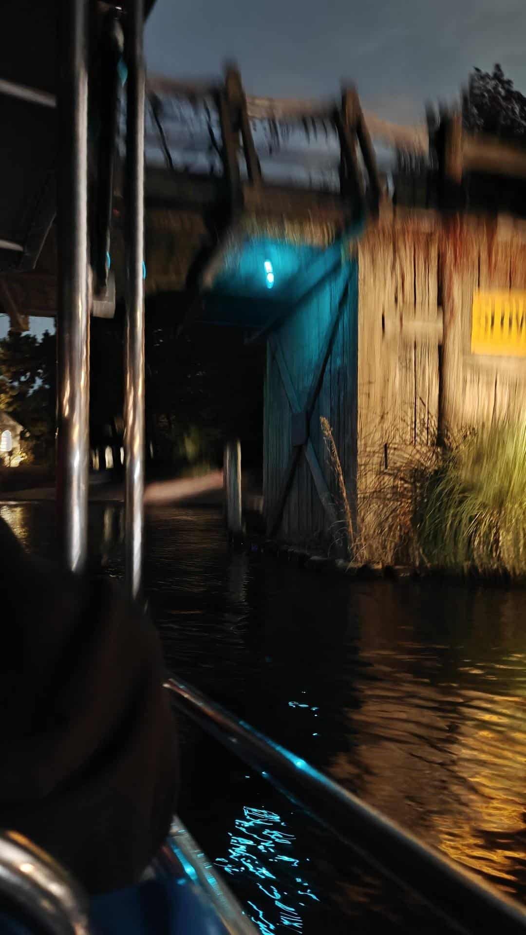 Blurry night scene with water reflections