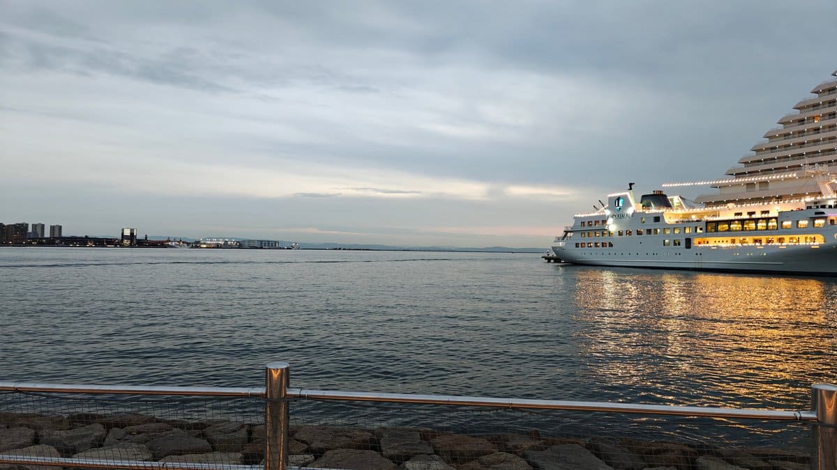 Brightly lit cruise/restaurant ship on the water at