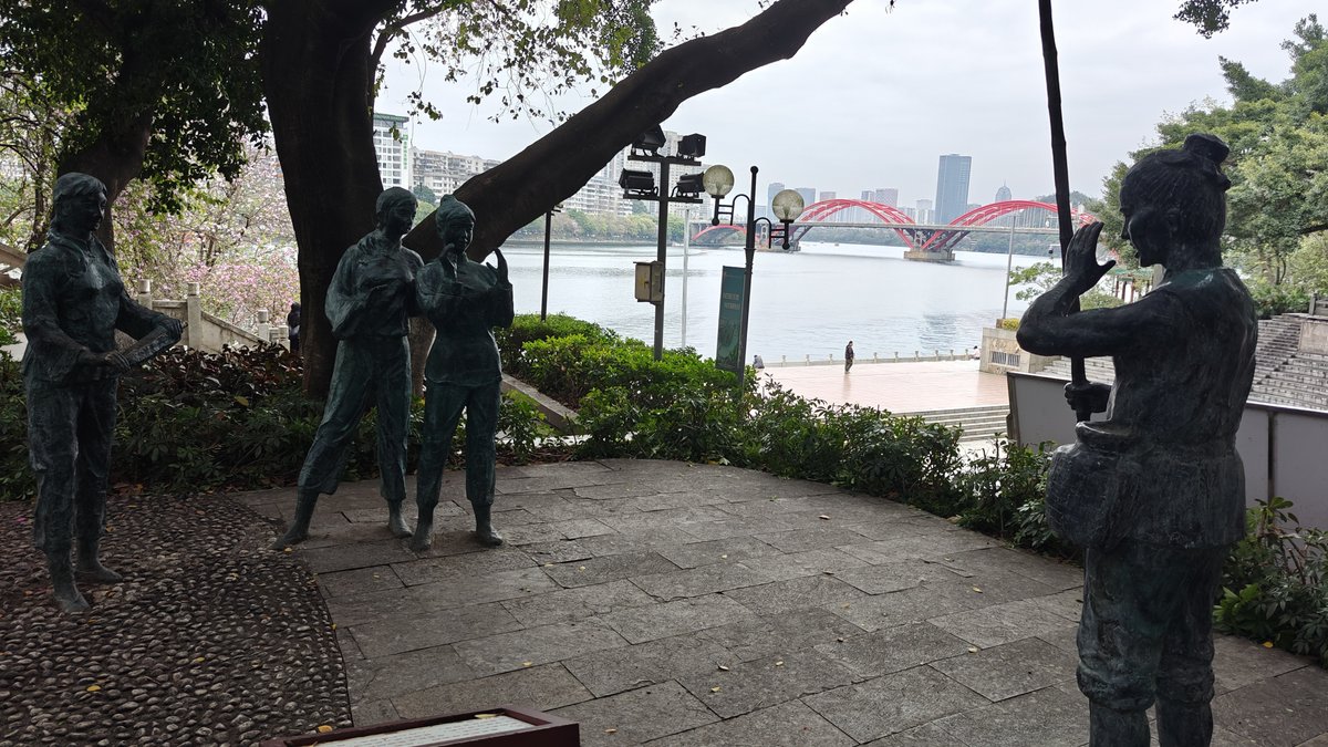 Bronze musician statues red bridge