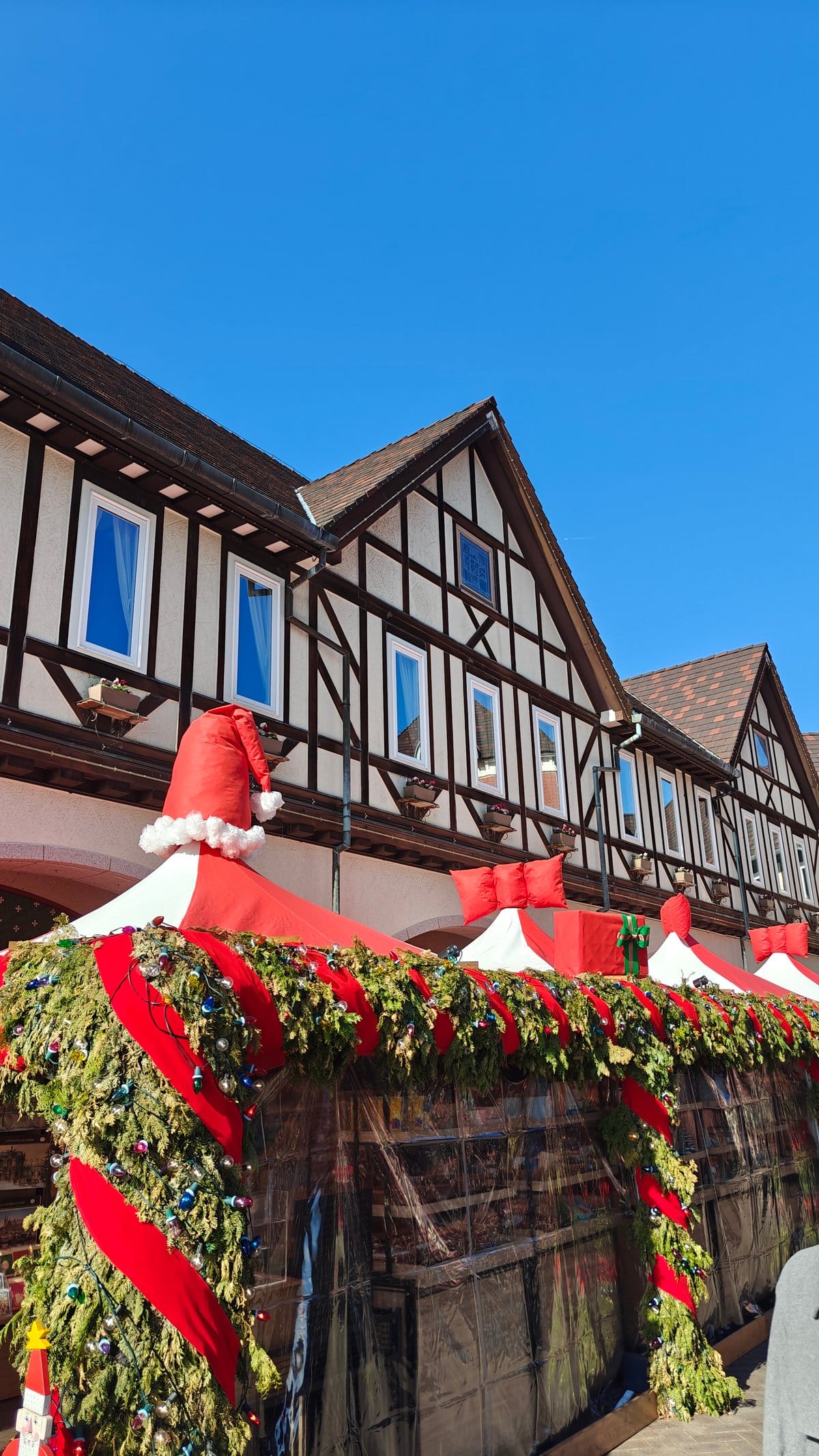 Building with Christmas garlands