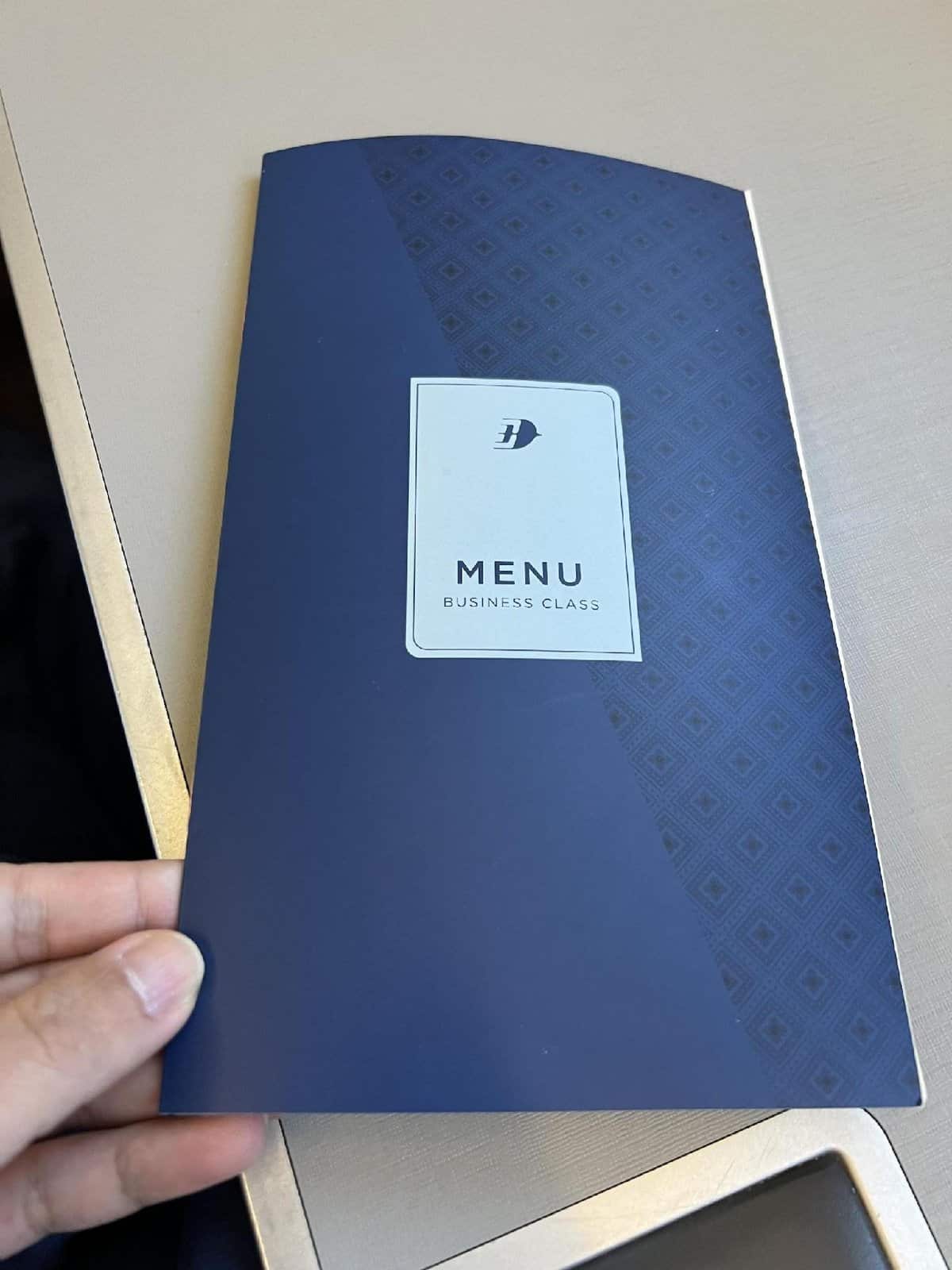 Business class menu on table