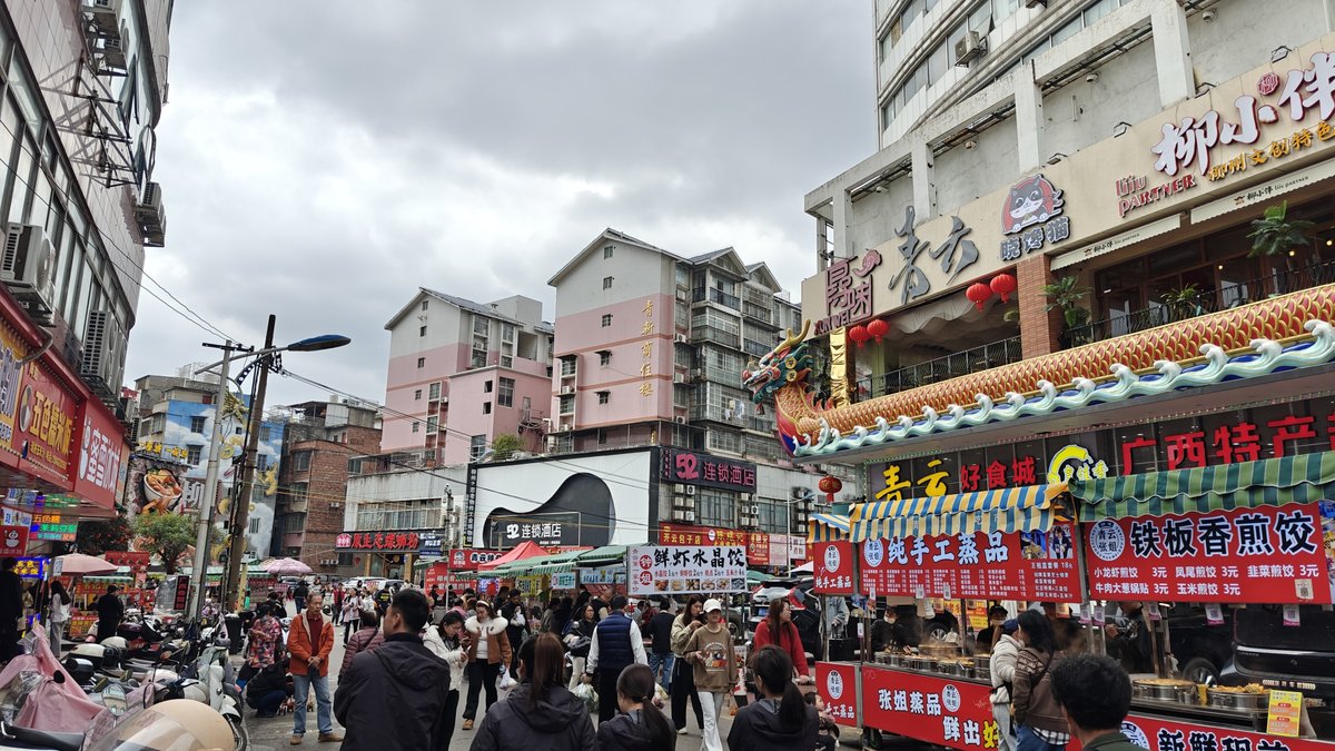 Busy market street with crowds