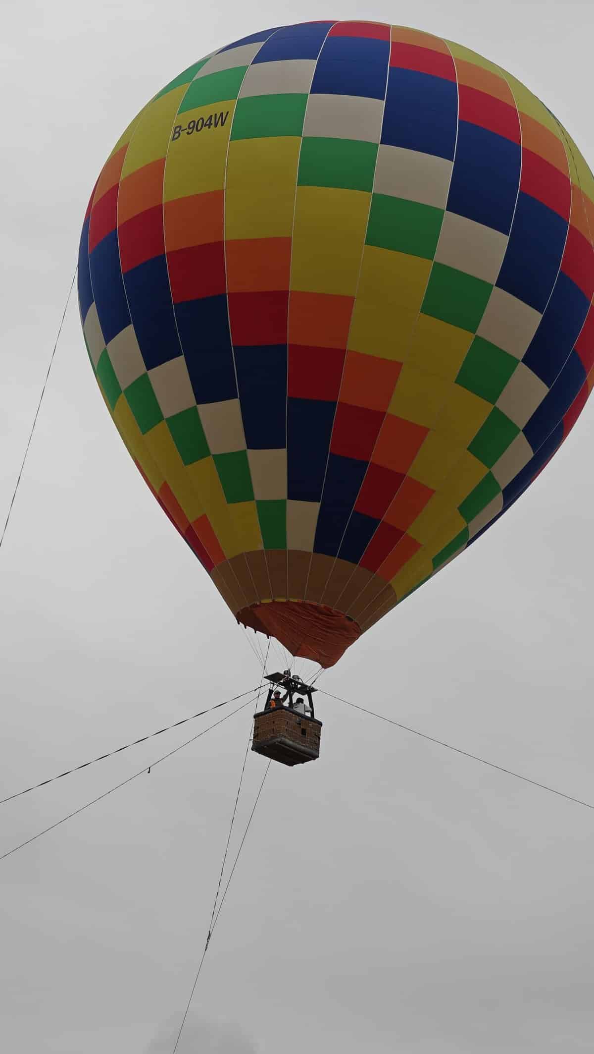 Checkered balloon in flight