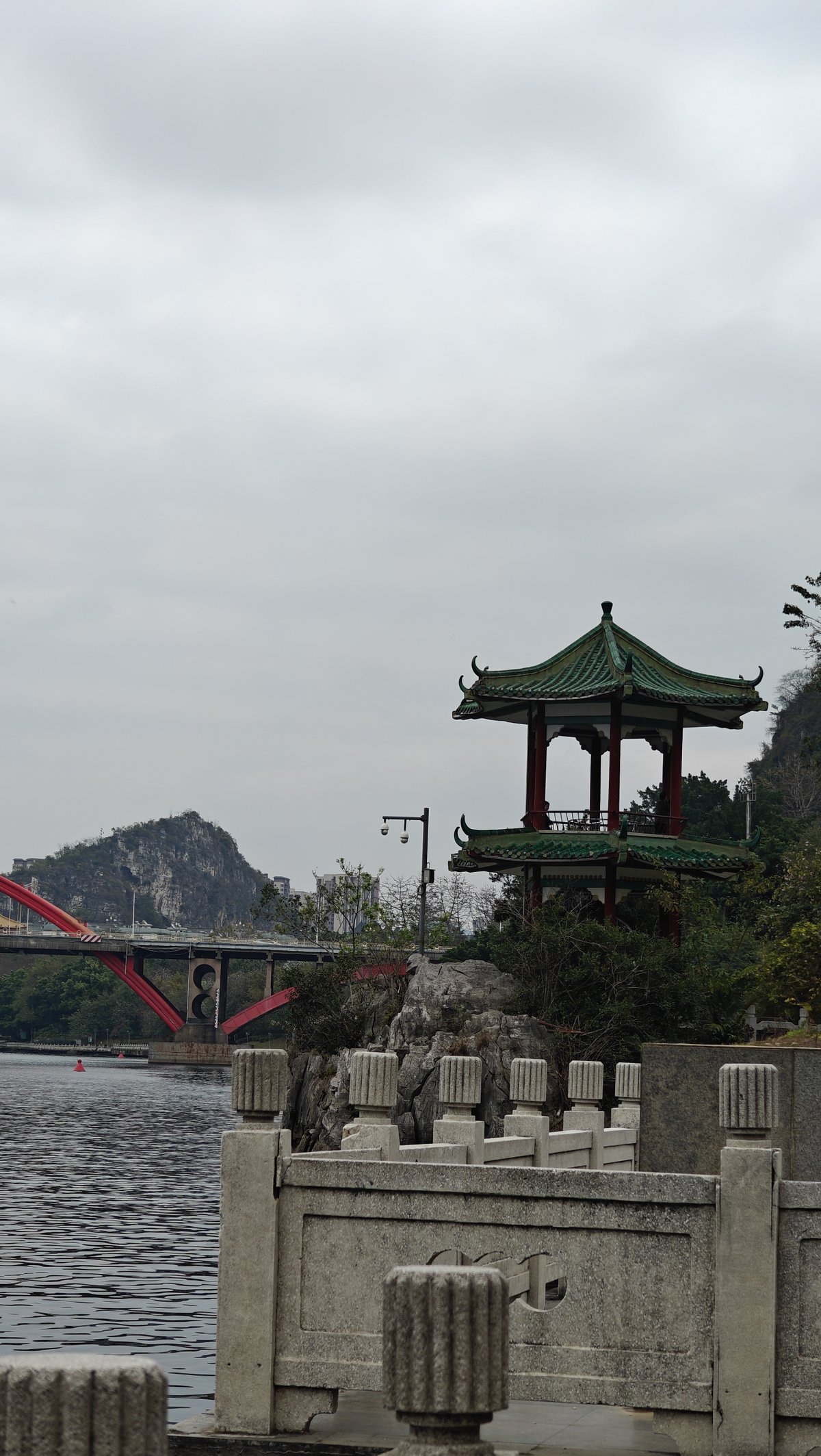 Chinese pavilion on riverside rocks