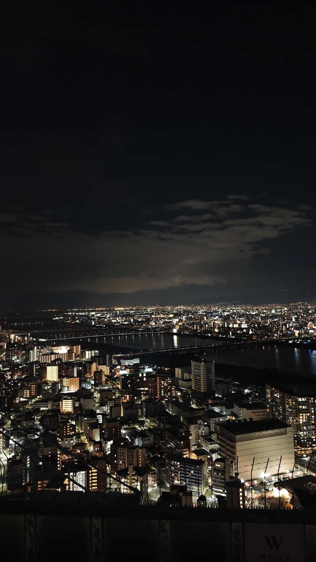 City skyline at night with bright lights