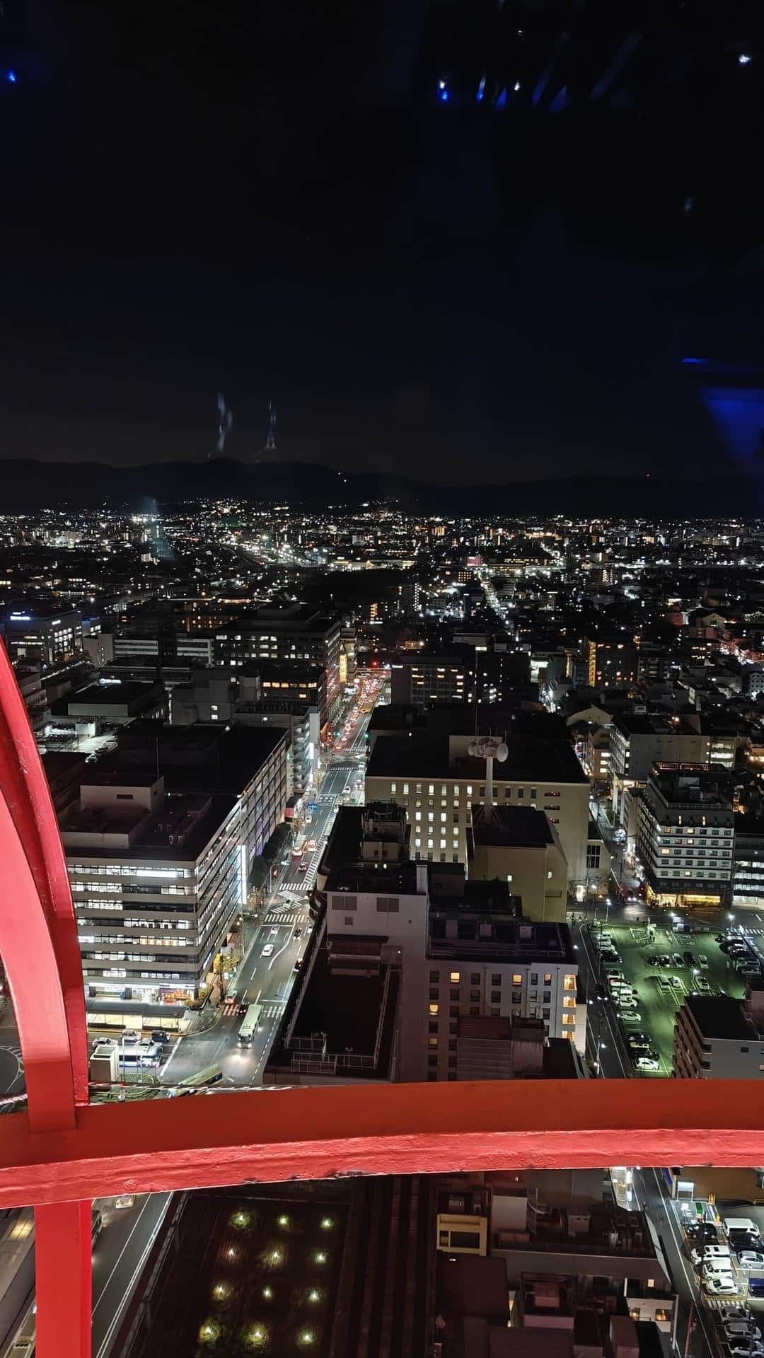 City skyline at night with bright lights